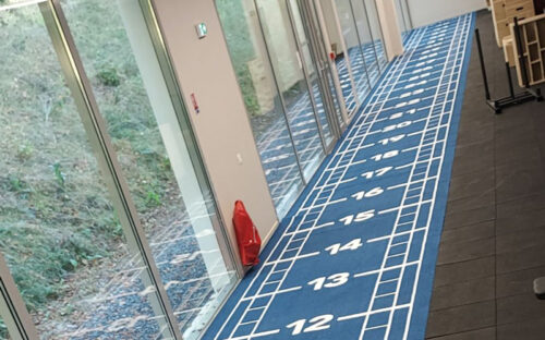 Pose de sols sportifs, sols PVC, sols techniques et carrelage dans pôle médico-sportif à Caen
